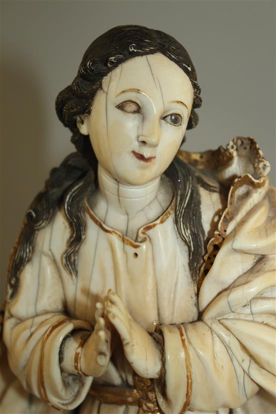 An 18th century Indo-Portuguese carved ivory figure of the Virgin Mary, probably Goa, c.1740-50, 11.5in.